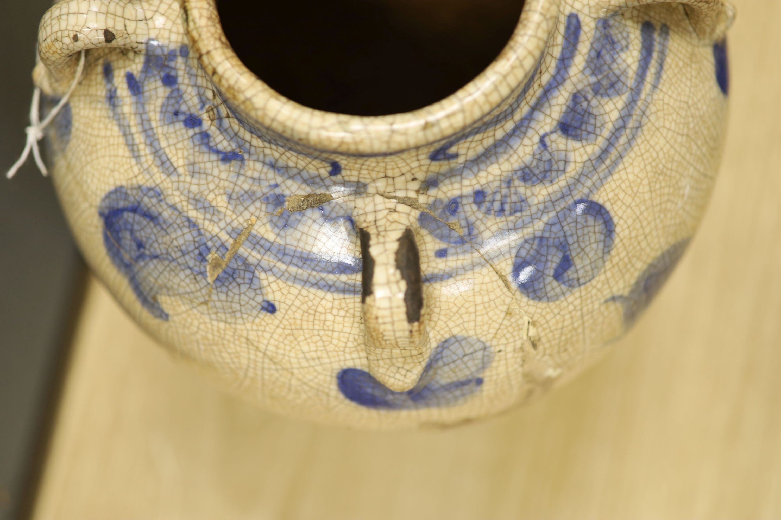 A large Chinese blue and white ‘dragon’ double gourd vase, 64cm high and an Annamese style blue and white crackle glaze jar